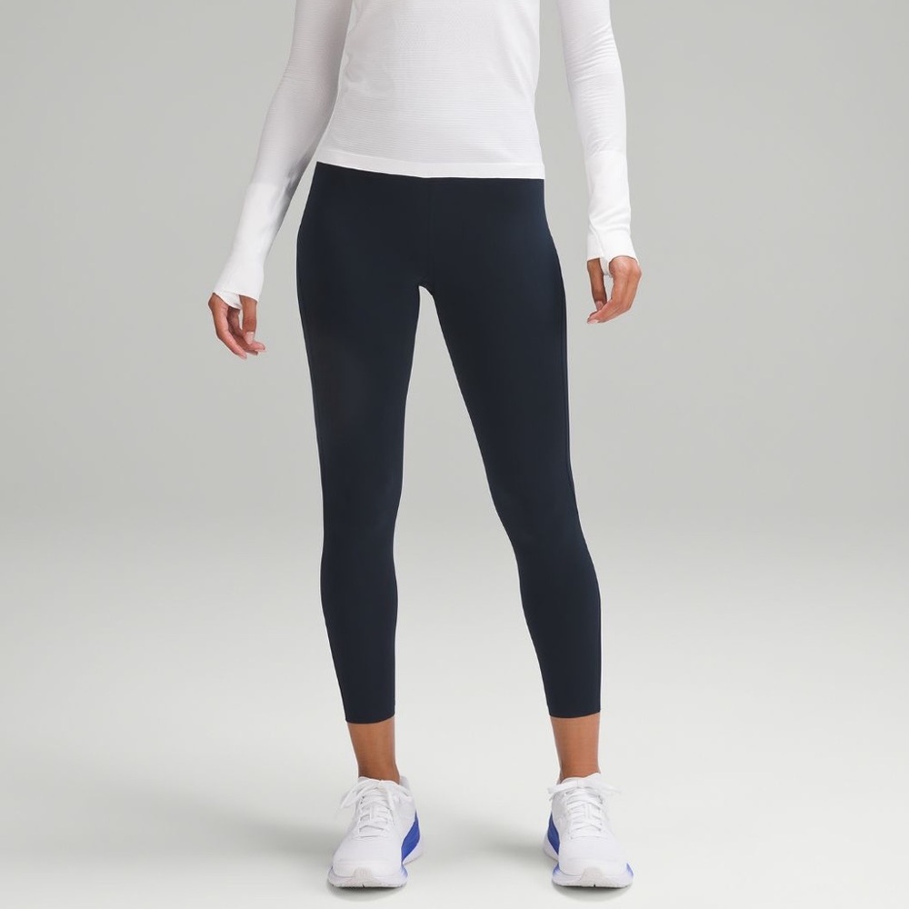 Lululemon Base Pace High-Rise Tight 25". Color: True Navy